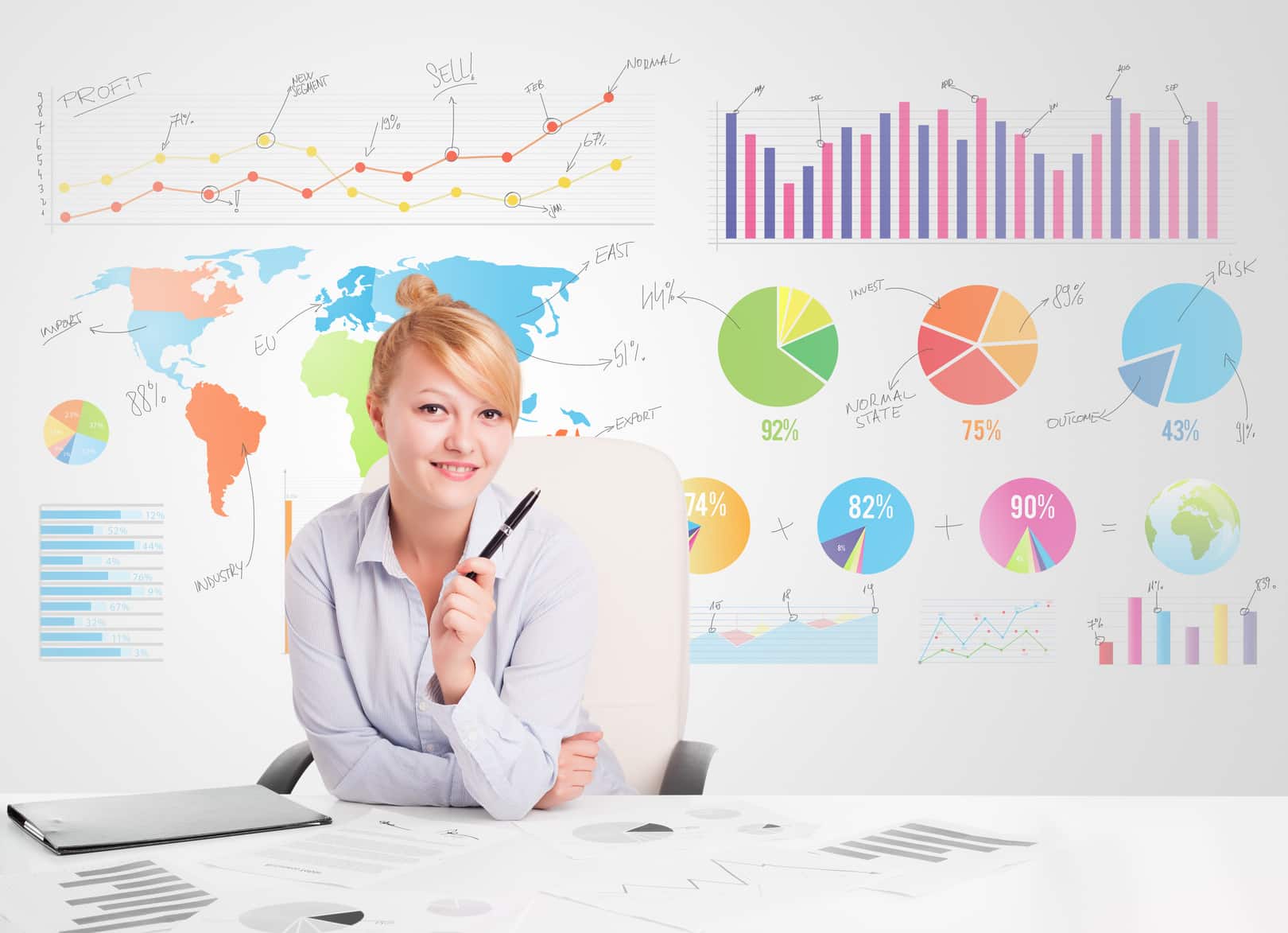 Stock photo showing a person working with graphs on a digital tablet.